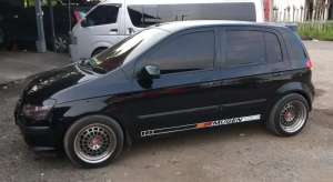 Dijual mobil HYUNDAI GETZ 2004 1.3 MT warna hitam , tersedia melalui melalui situs Olx