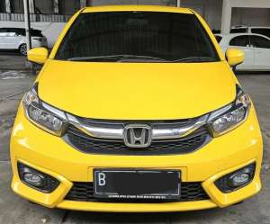Jual bekas Honda Brio E ATMatic2022 Kuning Km 35rban Mulus Siap Pakai,lokasi di Bekasi Kota