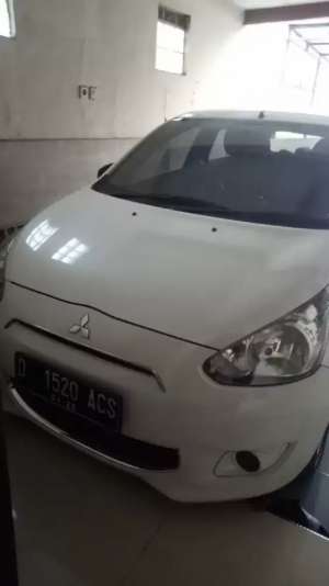 Jual Mobil Mitsubishi Mirage MT tahun 2014 Warna Putih Km 11.000 Mulus , tersedia melalui melalui situs Olx
