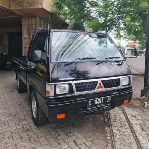 Jual bekas Mitsubishi L300 Pick up 2.5 disel bak rata 2021 akhir pmk 2022,lokasi di Surabaya Kota