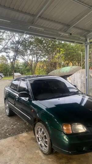Suzuki Baleno 2000 , tersedia melalui melalui situs Olx