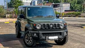 Jual bekas Suzuki Jimny AT 2021 hijau km 20rban pajak panjang cash kredit proses bisa dibantu,lokasi di DKI Jakarta