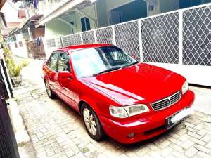 Jual bekas Corolla mt 1.8 th 2000 merah ferrari mulus,lokasi di 