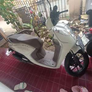 motor genio iss putih 2021 , tersedia melalui melalui situs Tokopedia