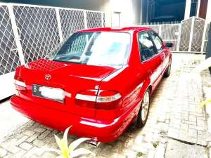 Jual bekas Corolla mt 1.8 SEG th 2000 merah ferrari mulus,lokasi di 