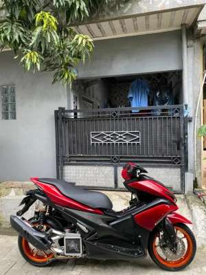 Aerox old 2019 warna merah lokasi di Pasar Kemis, tersedia melalui melalui situs Olx