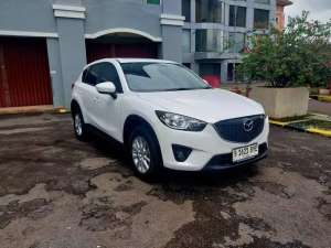 Jual bekas Mazda CX5 Touring 2.5 CC At 2013 Sundroof putih,lokasi di 