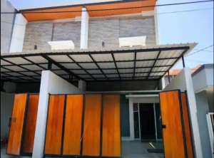 Rumah Modern 2 Lantai Free Canopi Di Perum. Rungkut Asri, Dekat MERR lokasi di Rungkut, tersedia melalui melalui situs Olx