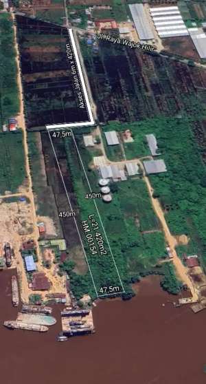 Tanah Tepi Jalan Raya Wajok Hilir sampai sungai lokasi di Pontianak Barat, tersedia melalui melalui situs Olx