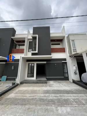 Cluster mewah 2,5 lantai lokasi pinggir jalan utama dan 5 menit ke tol lokasi di Beji, tersedia melalui melalui situs Olx