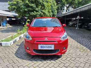 Jual bekas DP MURAH Mitsubishi Mirage 1.2 Exceed Bensin-AT 2015 Merah CWYIB,lokasi di 