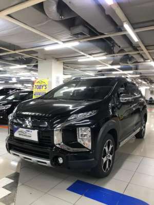 Jual bekas Xpander CROSS Premium 2022,Hitam,At,istimewa,siap pakai,Low km,Tdp Rgn,lokasi di 