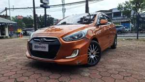 Jual bekas DP Rendah 4JT Hyundai Avega 1.4 Bensin-AT 2015 Orange,lokasi di 