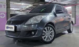 Jual bekas TDP 5,JT Suzuki Swift 1.4 GX Bensin-MT Biru 2012,lokasi di 