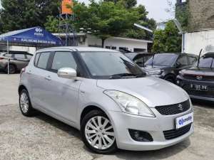 Jual bekas PROMO Low Angsuran Suzuki Swift 1.4 GX Bensin-AT 2014 EVB,lokasi di 