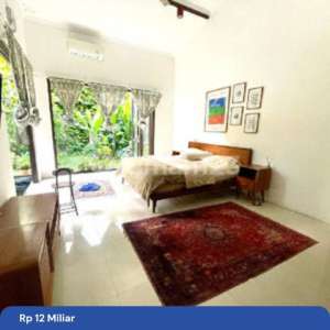 Rumah Gaya Etnik Industrial Dengan Kamar Utama Di Lantai Dasar , tersedia melalui melalui situs Rumah123