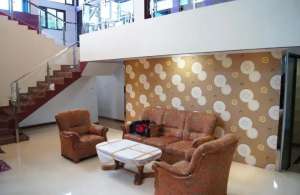 Rumah Modern di jalan raya hankam lokasi di Pondok Gede, tersedia melalui melalui situs Olx