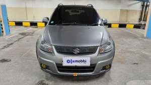 Jual bekas TDP 4,JT Suzuki SX4 1.5 X-Over Bensin-MT Abu 2008,lokasi di 
