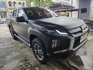 Jual bekas Mitsubishi Triton Double Cabin 4X4 At Ultimate 2023 Hitam,lokasi di Jawa Timur