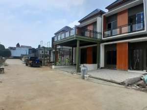rumah minimalis modern balkon super luas 2 km ke tol jatiwarna , tersedia melalui melalui situs Olx