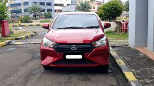 Jual bekas Daihatsu Ayla 1.0L X AT 2025 merah km 16 ribuan matic,lokasi di Jakarta DKI