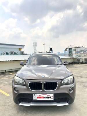 Jual bekas BMW X1 Executive Tahun 2011 Automatic Coklat Metalik,lokasi di Cilegon Kota
