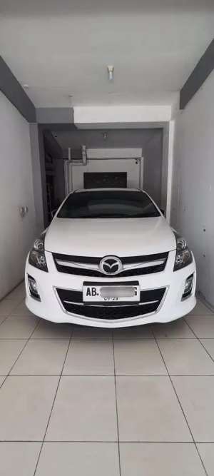 Jual bekas Dijual Mazda 8 Putih CBU AT 7 seater captain seat sunroof,lokasi di Yogyakarta Kota