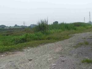 Dijual tanah darat lebar muka kurang lebih 100meter lokasi di Karawang Kab., tersedia melalui melalui situs Olx