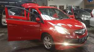 Jual bekas DP 9 JT Honda Brio E Satya 1.2 Manual 2015 Mulus Merah,lokasi di Bandung Kota