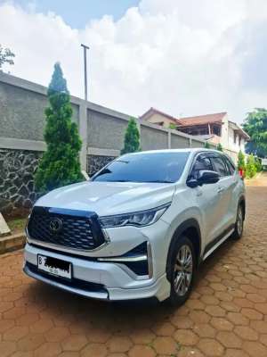 Jual bekas Harga Cash Innova Zenix Q HEV TSS Modellista NIK 2022 Putih,lokasi di Jakarta Timur