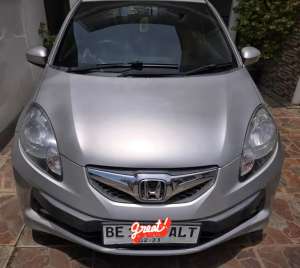 Jual bekas Honda Brio E MT 2015 plat BE silver,lokasi di Bandar Lampung Kota