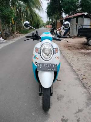 Jual bekas Honda Scoopy Stylish Playful Doraemon FI Tahun 2017,lokasi di Palangkaraya Kota