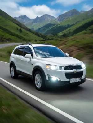 Jual bekas ISTIMEWA CHEVROLET CAPTIVA FL2 2014 DIESEL PUTIH,lokasi di Surabaya Kota