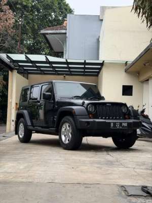 Jual bekas Jeep wrangler jk sport 2011 hitam km 38rb,lokasi di  