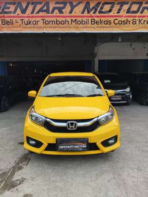 Jual bekas KM 36RB Brio 1.2 E Kuning Pekat CVT Automatic 2022 Bagus Terawat OK,lokasi di Palembang Kota