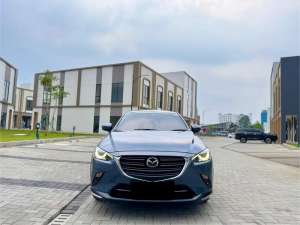 Jual bekas KM 8 RIBU Mazda CX3 Sport 1.5 Improvement Sunroof Abu-abu 2024,lokasi di Tangerang Kota