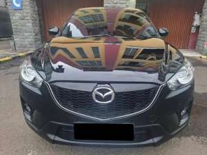Jual bekas Mazda Cx-5 CX5 2 5 Touring Skyactive Hitam AT 2014 Low Km,lokasi di Jakarta Selatan
