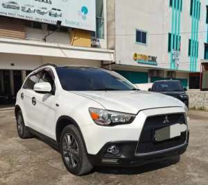 Jual bekas Outlander PX panoramic Matic 2013 putih istimewa dp 28 jt,lokasi di Palembang Kota