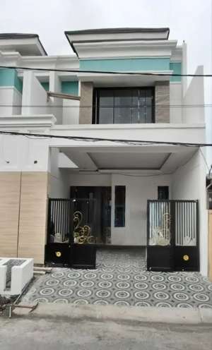 Rumah American Classic Mewah Babatan Pantai lokasi di Surabaya Kota, tersedia melalui melalui situs Olx