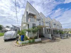 Rumah Depok cluster Medina Townhouse SHM IMB Ready Desain modern minimalis strategis dekat Stasiun dekat Tol Depok akses transportasi ke Jabodetabek lokasi di Depok Kota, tersedia melalui melalui situs Olx