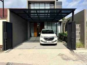 RUMAH MODERN 2 LANTAI KONTEMPORER MODERN FULL FURNISHED DI JALAN TAJEM MAGUWOHARJO lokasi di Sleman Kab., tersedia melalui melalui situs Olx