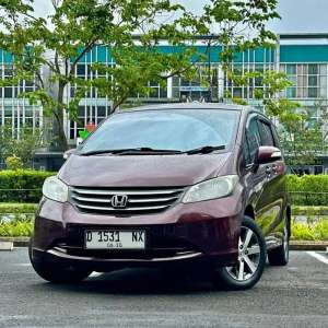 Jual bekas TDP 20 JT Honda Freed 1.5 E AT PSD 2012 merah marun antik istimewa,lokasi di Bandung Kota