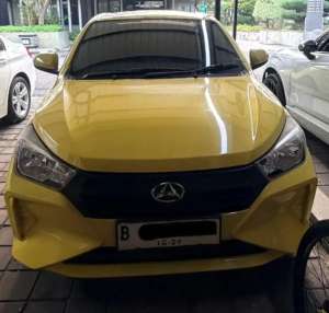 Jual bekas Daihatsu Ayla 1.0 X AT Matic 2024 Kuning Yellow Gress Banget,lokasi di Jakarta Pusat