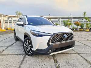 Jual bekas KM30.000TOYOTA COROLLA CROSS 1.8 HYBRID AT PUTIH 2022,lokasi di  