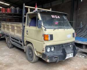Mitsubishi fe 104 1996 ps100 umplung 4 ban bak triway tuck truk engkel lokasi di  , tersedia melalui melalui situs Olx