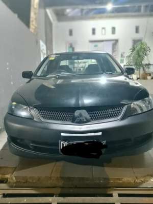 Mitsubishi Lancer 2010 Bensin lokasi di  , tersedia melalui melalui situs Olx