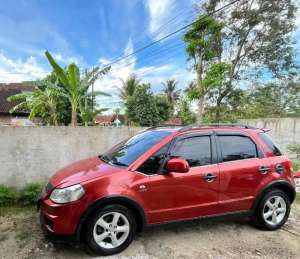 Mobil Suzuki SX4 2008 oranye metalic lokasi di  , tersedia melalui melalui situs Olx