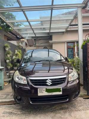 Jual bekas Suzuki neo baleno merah burgundy manual 2008,lokasi di Bandar Lampung Kota