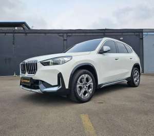 Jual bekas TDP 100JT BMW X1 2023 Sdrive 18i Low KM Record,lokasi di Tangerang Kota