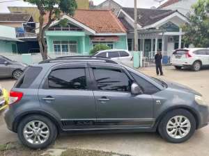 X over SX4 metik 2009 lokasi di  , tersedia melalui melalui situs Olx